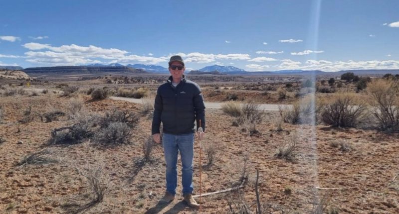 Mandrake Resources (ASX:MAN) -Managing Director James Allchurch next to a claim stake at the Utah Lithium Project